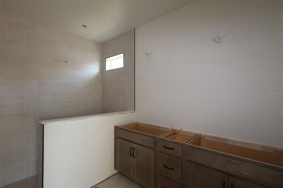 In-progress construction of a new home in Waterset Tradition Series, Apollo Beach, FL (Image 9).