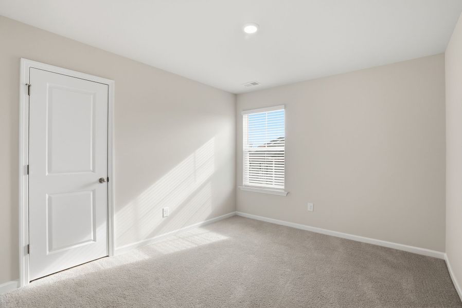 Representative unfurnished interior of a home built from the Juniper B by McGuinn Homes in Hunters Branch, Hopkins (Image 41).