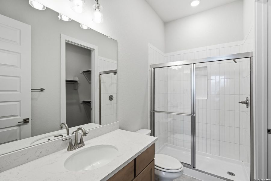 Furnished interior view inside a new home in Potranco Oaks, Castroville (Image 16).
