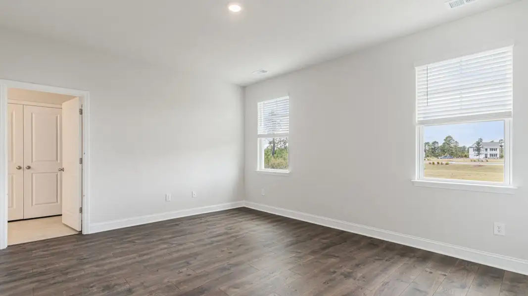 Representative unfurnished interior of a home built from the Covington by D.R. Horton in The Highlands at Cedar Hill Landing, Navassa (Image 25).
