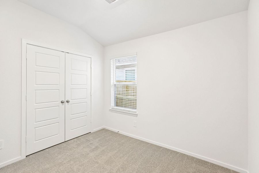 Spacious, unfurnished interior of a new home in Riviera Pines - Traditional Series, Conroe (Image 15).