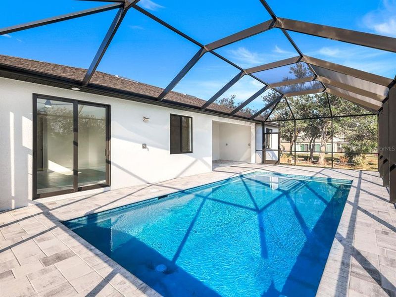 Front exterior of a new home in , Port Charlotte, FL, highlighting curb appeal (Image 14).