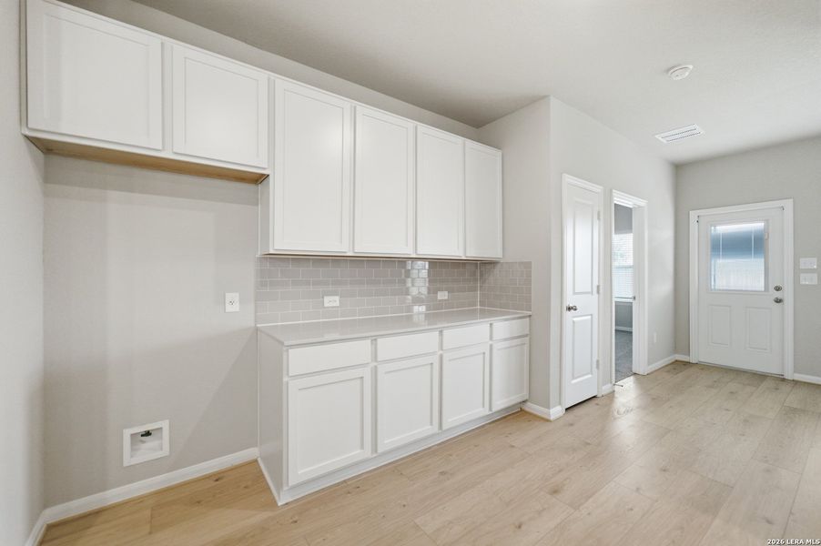 Furnished interior view inside a new home in Hennersby Hollow, San Antonio (Image 10).