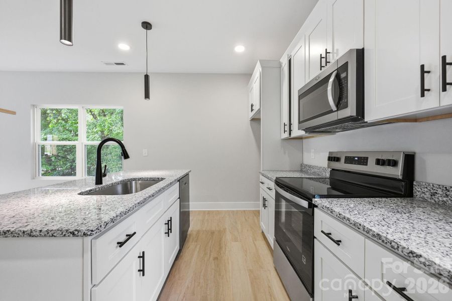 Furnished interior view inside a new home in , Albemarle (Image 4).
