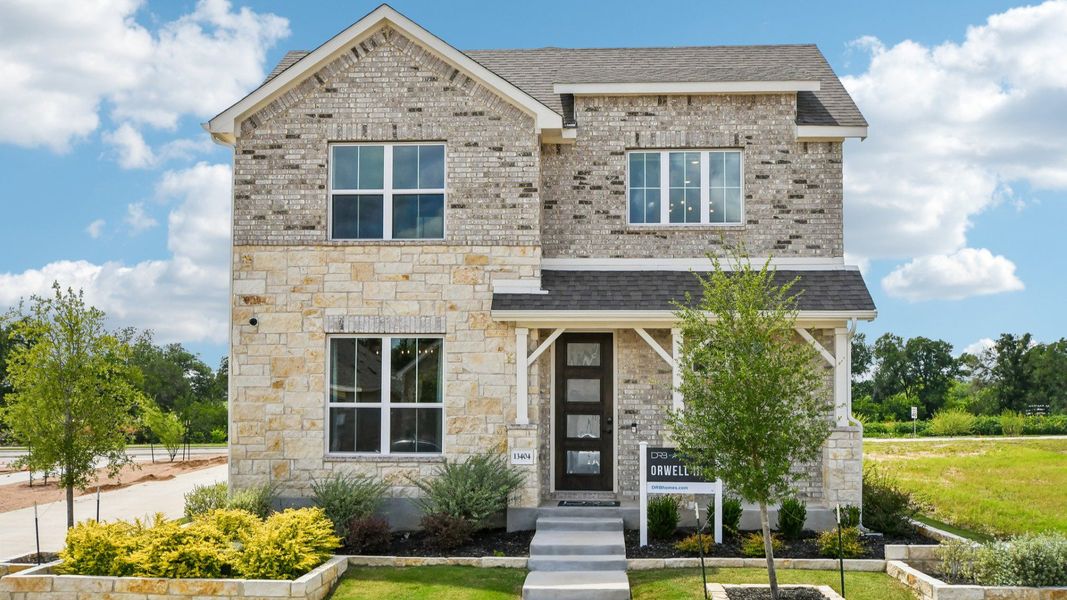 Representative exterior photo of a completed home built from the Orwell III by DRB Homes in Flora, Hutto, TX (Image 21). Representative exterior photo of a completed home built from the Orwell III by DRB Homes in Flora, Hutto, TX (Image 21).