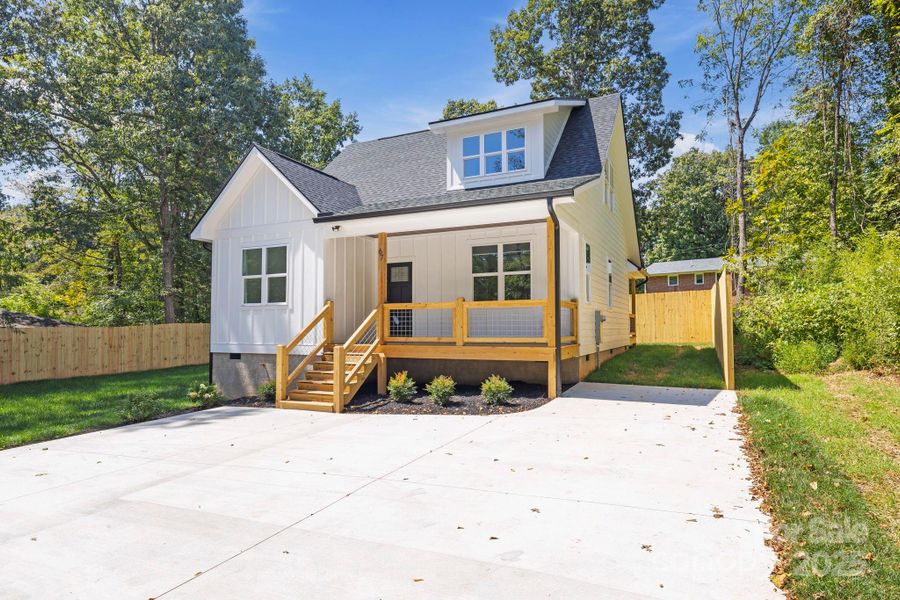 Front exterior of a new home in , Flat Rock, NC, highlighting curb appeal (Image 18).