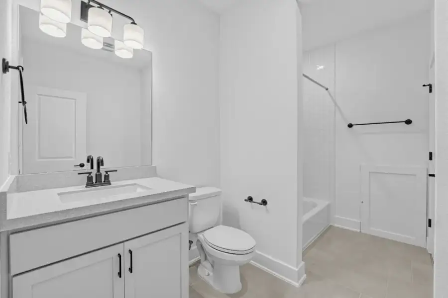 Furnished interior view inside a new home in Travisso, Leander (Image 11).