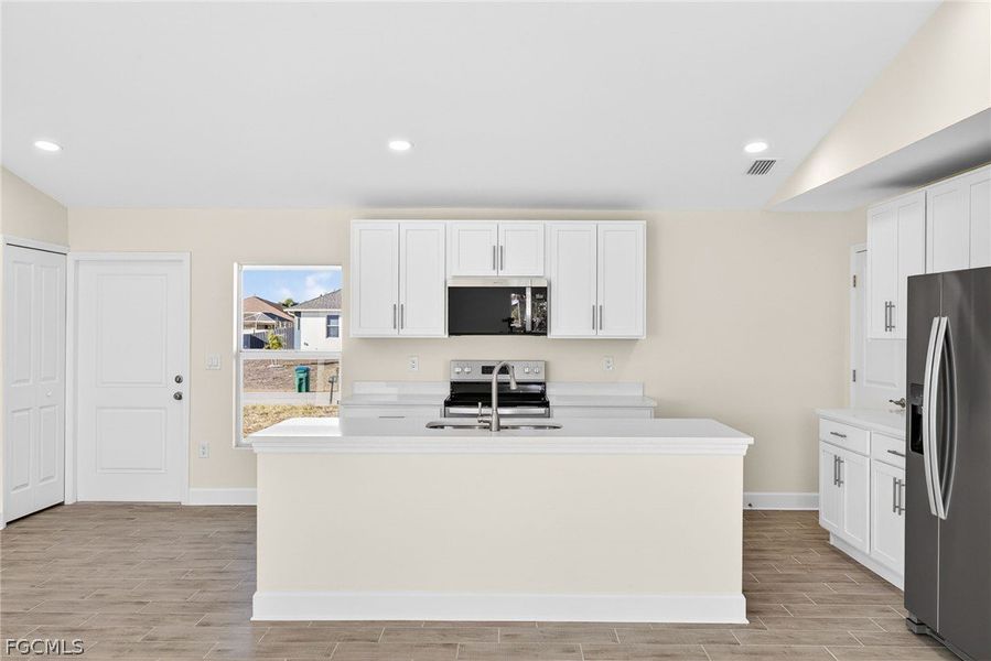 Furnished interior view inside a new home in Cape Coral, Cape Coral (Image 8). Furnished interior view inside a new home in Cape Coral, Cape Coral (Image 8).