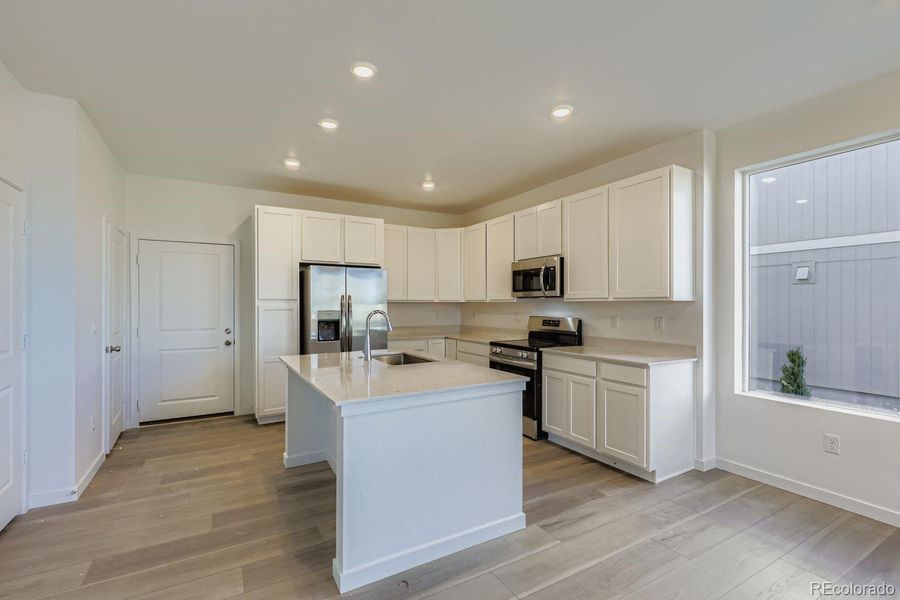Furnished interior view inside a new home in Parterre: The Parkside Collection, Thornton (Image 4).