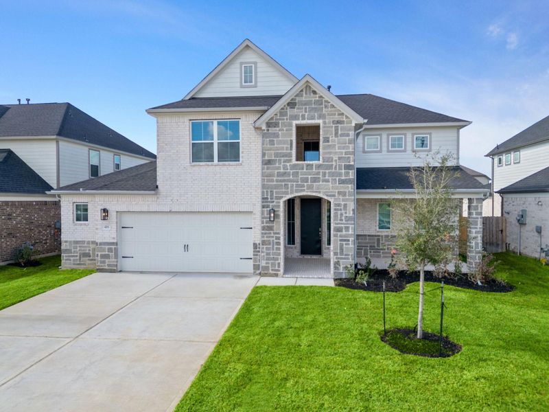 Front exterior of a new home in Beacon Hill, Waller, TX, highlighting curb appeal (Image 12).