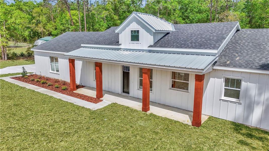 Exterior details and patio area of a home in , Ocala (Image 28).
