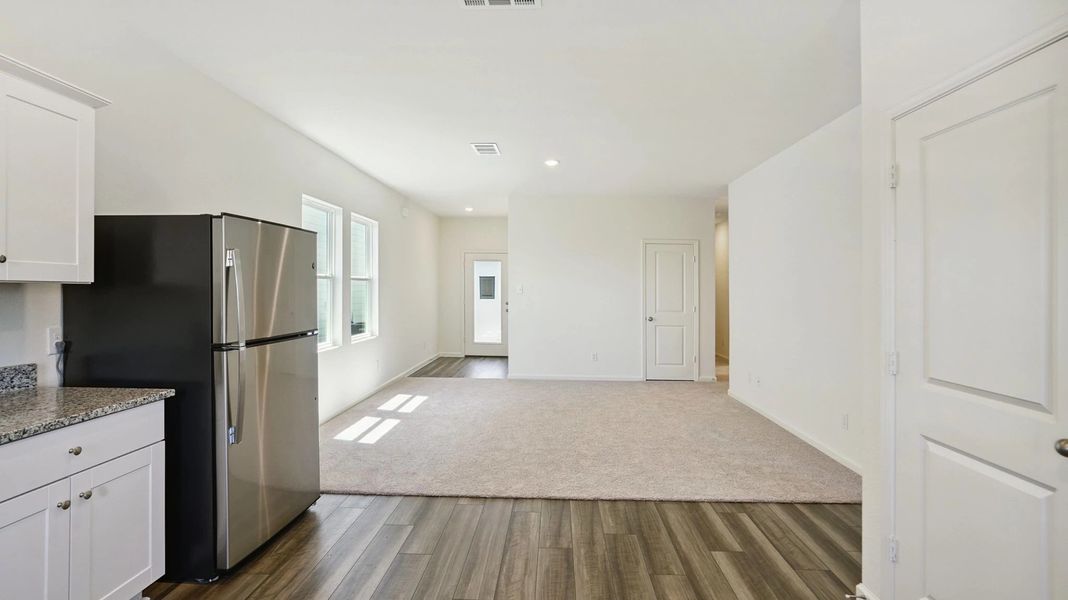 Representative unfurnished interior of a home built from the Atlantis by Starlight Homes in Stonebrooke, Conroe (Image 12). Representative unfurnished interior of a home built from the Atlantis by Starlight Homes in Stonebrooke, Conroe (Image 12).