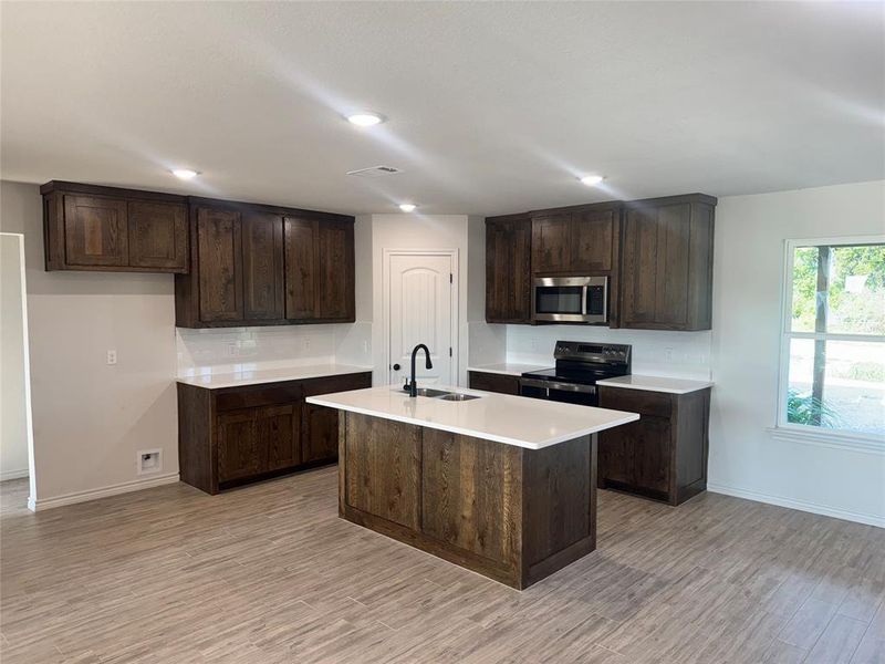 Furnished interior view inside a new home in Thomas Len Estates, Weatherford (Image 2). Furnished interior view inside a new home in Thomas Len Estates, Weatherford (Image 2).