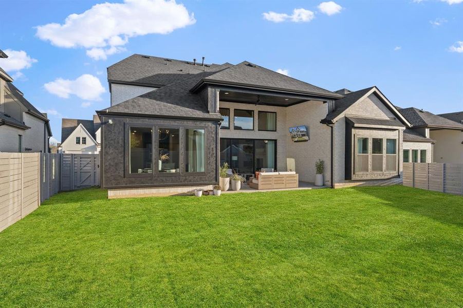 Exterior details and patio area of a home in Painted Tree 60' Series, McKinney (Image 4).