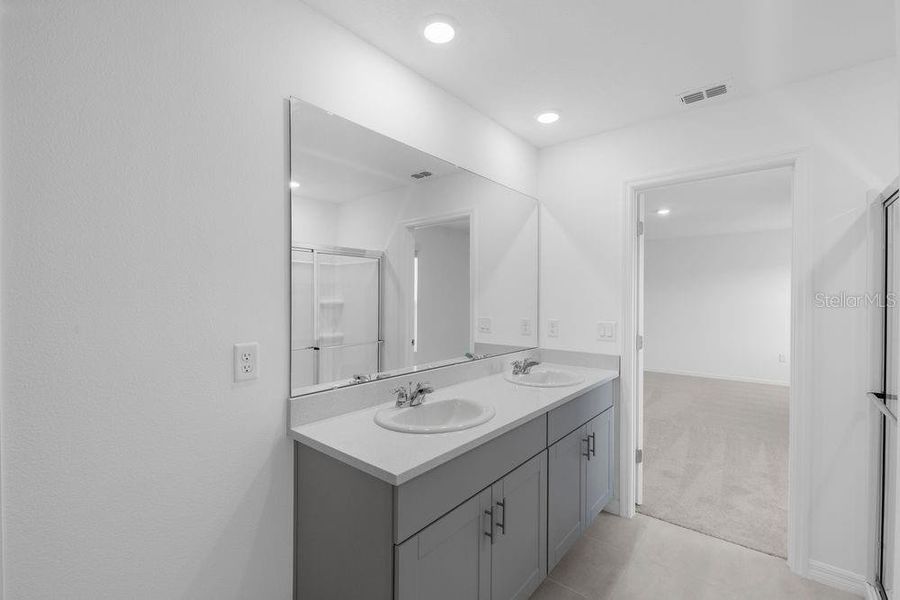 Furnished interior view inside a new home in Waterstone, Groveland (Image 21). Furnished interior view inside a new home in Waterstone, Groveland (Image 21).