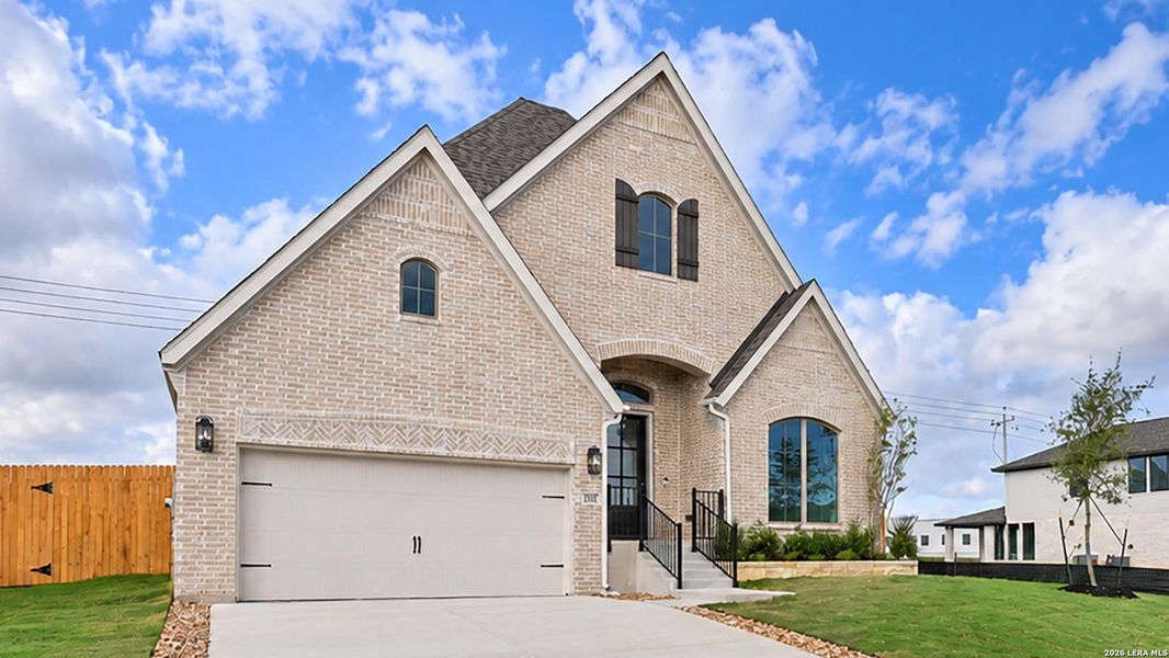 Front exterior of a new home in Cibolo Valley Heights, Cibolo, TX, highlighting curb appeal (Image 2).