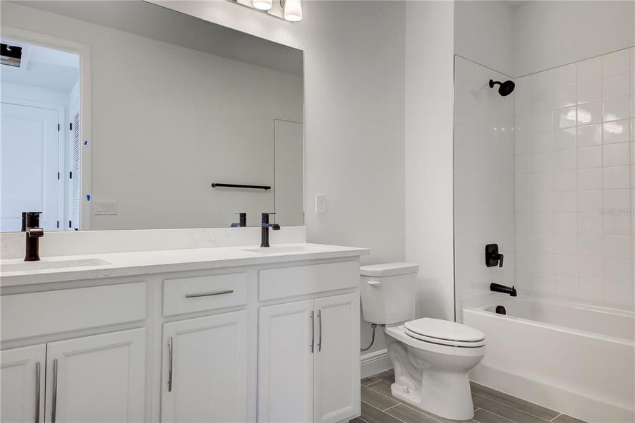 Furnished interior view inside a new home in Bungalow Walk at Lakewood Ranch, Lakewood Ranch (Image 5).