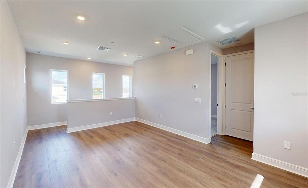 Spacious, unfurnished interior of a new home in Laureate Park, Orlando (Image 22).