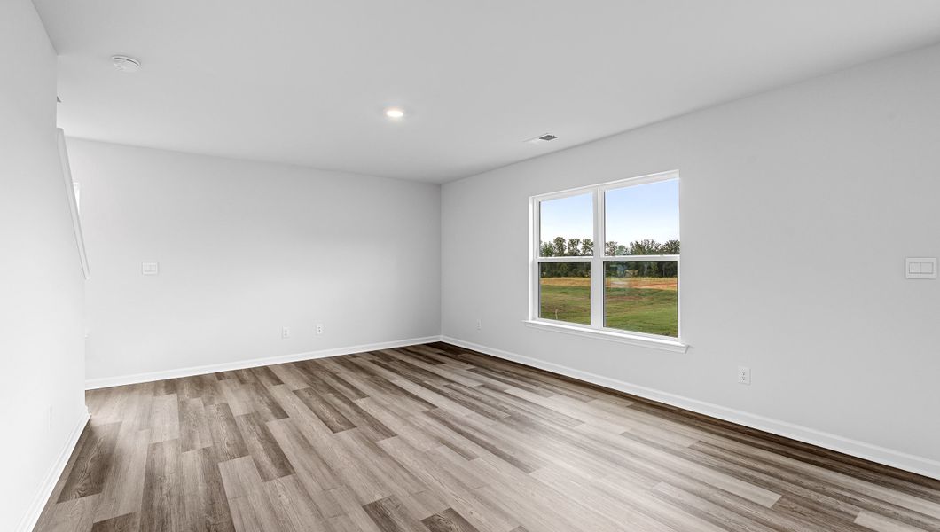 Spacious, unfurnished interior of a new home in Bentley Park, Greenwood (Image 20).
