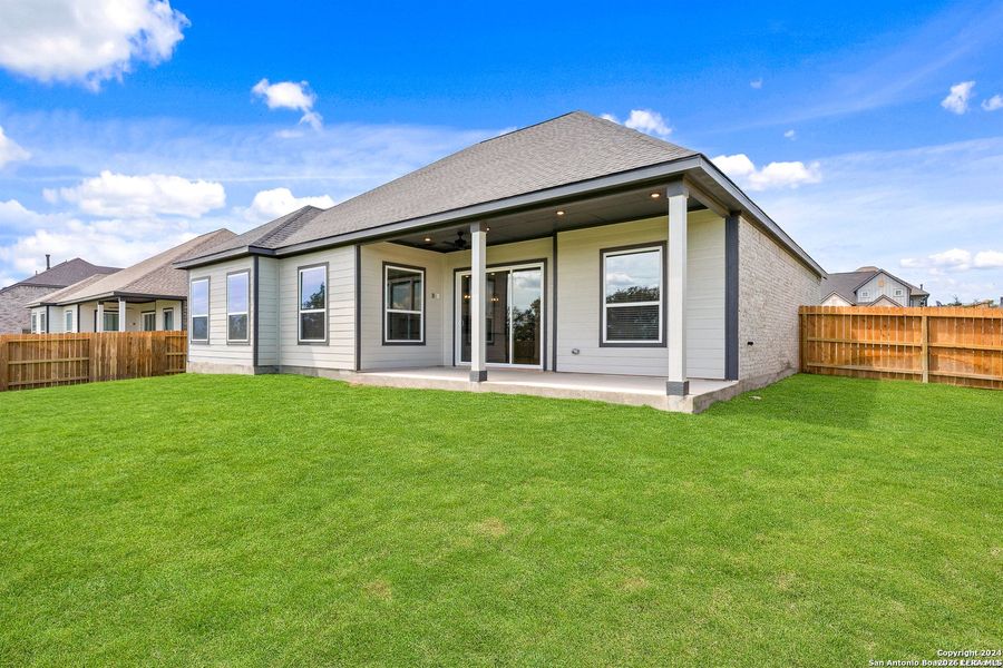 Exterior details and patio area of a home in Potranco West, Castroville (Image 3).