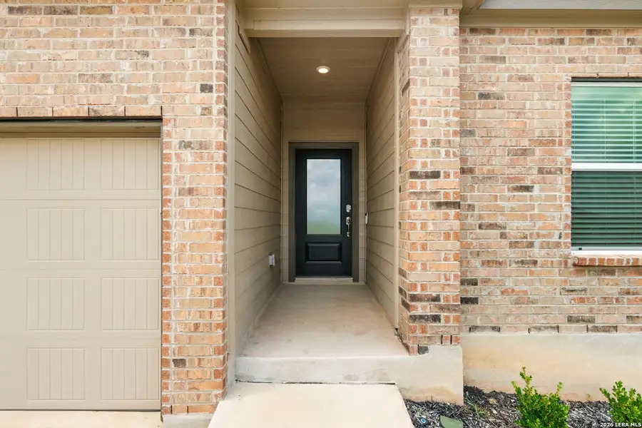 Exterior details and patio area of a home in Hidden Trails, Bulverde (Image 23).