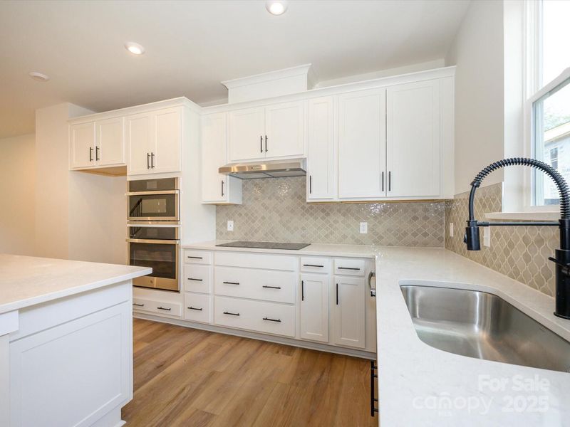 Deep Single Basin Sink with Functional and Thoughtful Placement. Designer Selected Finishes Throughout.