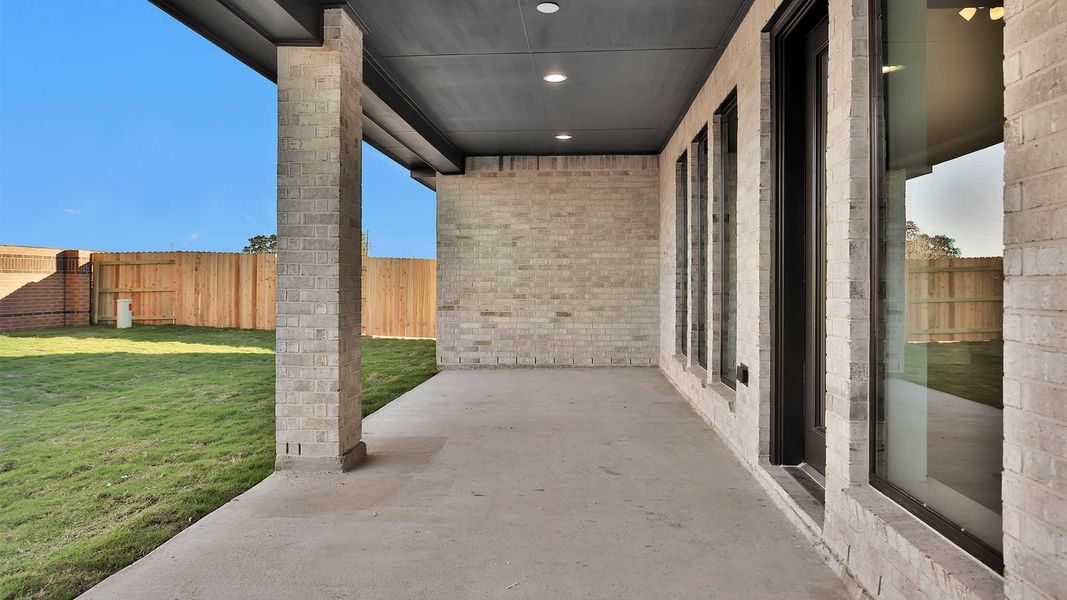 Exterior details and patio area of a home in Elyson 55', Katy (Image 3). Exterior details and patio area of a home in Elyson 55', Katy (Image 3).