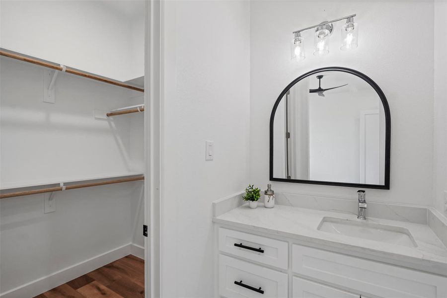 Cozy third bedroom with ample closet space and a Jack & Jill bathroom.