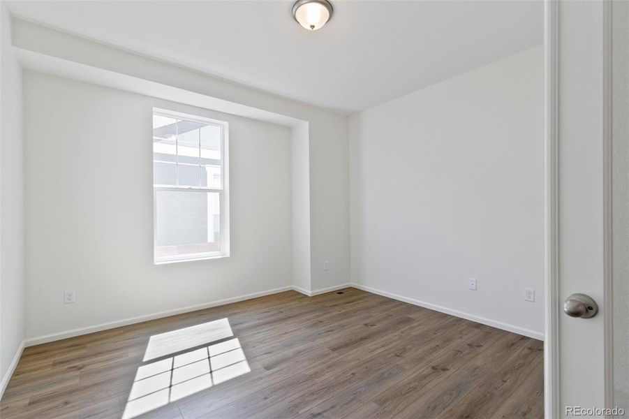 Spacious, unfurnished interior of a new home in Farmlore, Brighton (Image 24).