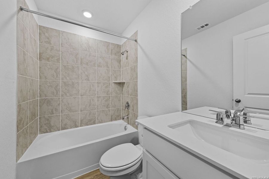 Furnished interior view inside a new home in Hickory Ridge, Elmendorf (Image 11).