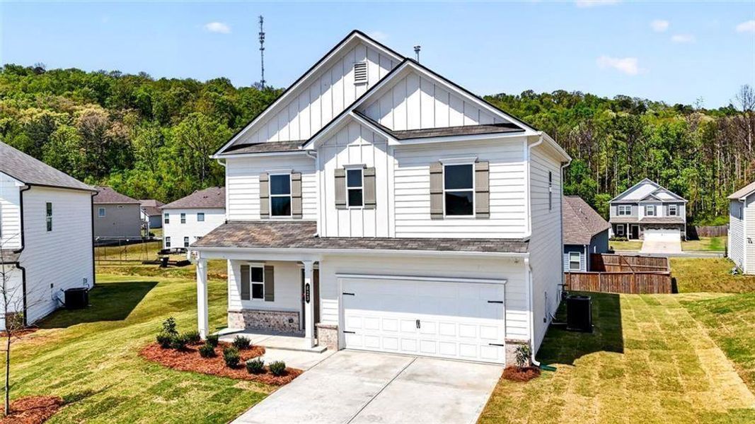 Front exterior of a new home in The Stiles, Cartersville, GA, highlighting curb appeal (Image 18).