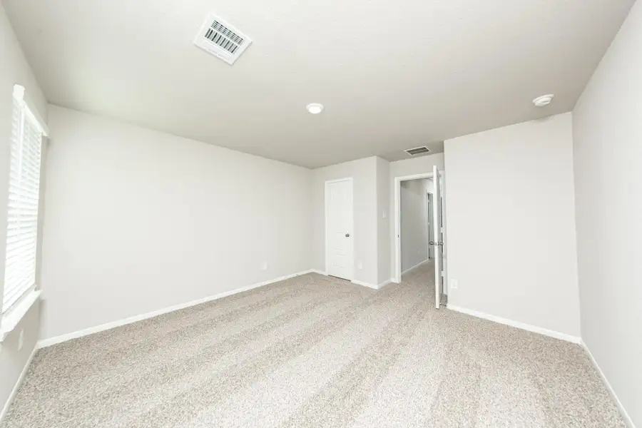 Spacious, unfurnished interior of a new home in Mackenzie Creek, Conroe (Image 15). Spacious, unfurnished interior of a new home in Mackenzie Creek, Conroe (Image 15).