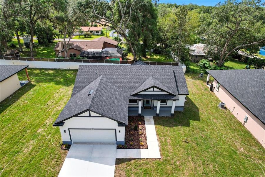 Front exterior of a new home in , Inverness, FL, highlighting curb appeal (Image 2).