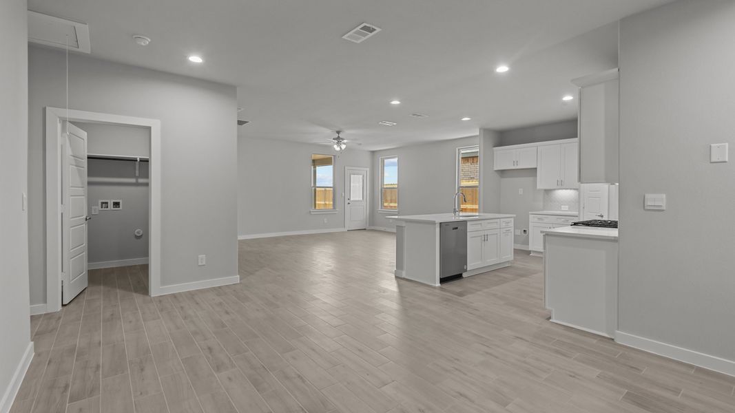 Representative unfurnished interior of a home built from the LAS CRUCES by D.R. Horton in Northwest Passage, Midland (Image 9). Representative unfurnished interior of a home built from the LAS CRUCES by D.R. Horton in Northwest Passage, Midland (Image 9).