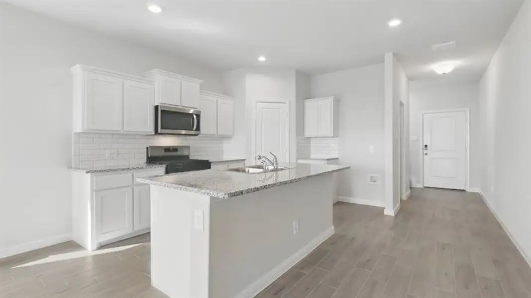Kitchen - All Home and community information, including pricing, included features, terms, availability and amenities, are subject to change at any time without notice or obligation. All Drawings, pictures, photographs, video, square footages, floor plans, elevations, features, colors and sizes are approximate for illustration purposes only and will vary from the homes as built.