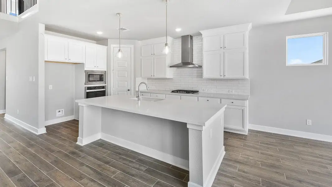 Furnished interior view inside a new home in Grand Central Park, Conroe (Image 6).