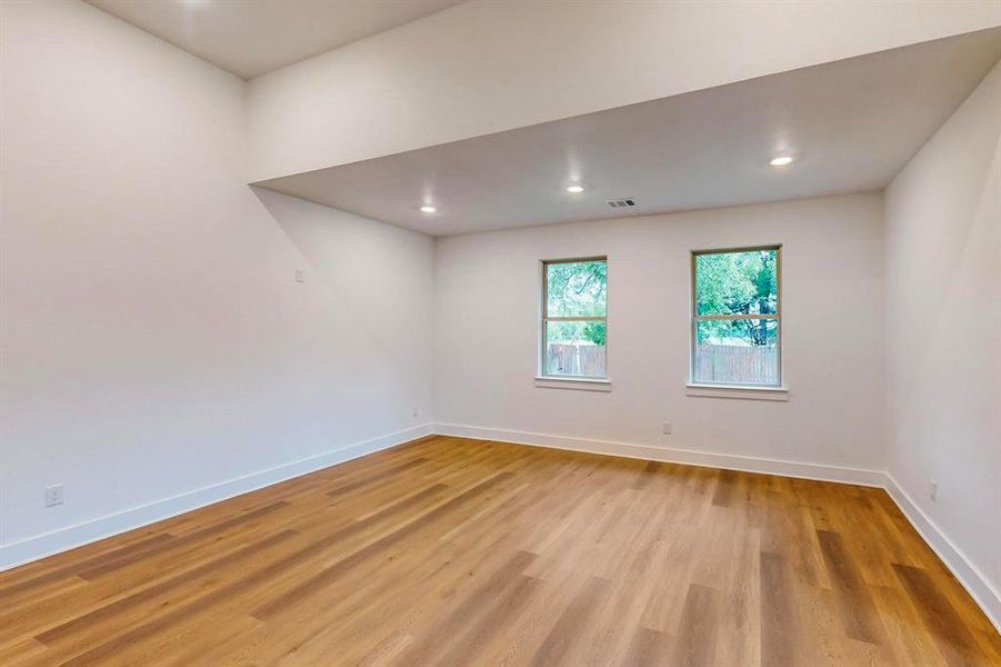 Empty room featuring light wood-type flooring