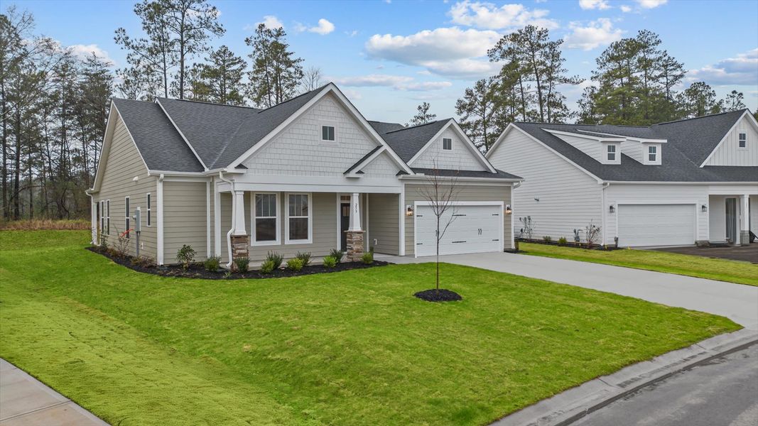 Exceptional home with tasteful exterior finishes and a thoughtfully designed façade