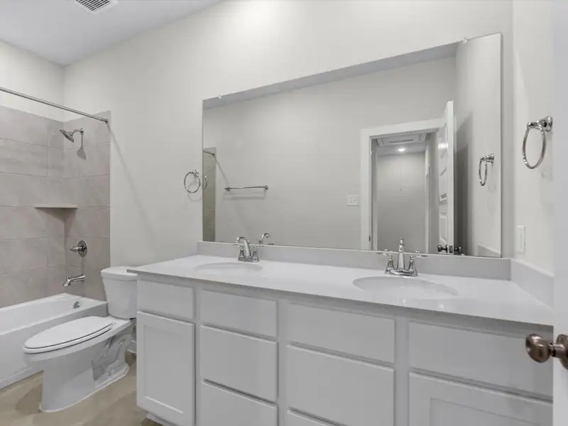 Furnished interior view inside a new home in Mason Woods, Cypress (Image 6). Furnished interior view inside a new home in Mason Woods, Cypress (Image 6).