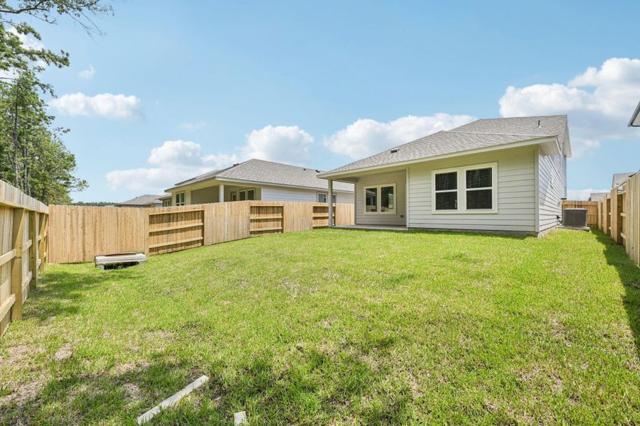 Front exterior of a new home in Landing Meadows - Traditional Series, New Caney, TX, highlighting curb appeal (Image 2).