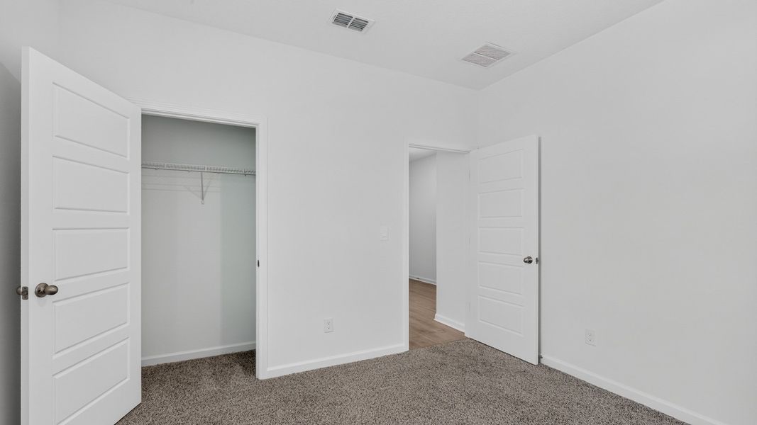 Representative unfurnished interior of a home built from the Alden by D.R. Horton in Broward Key, Jacksonville (Image 24).