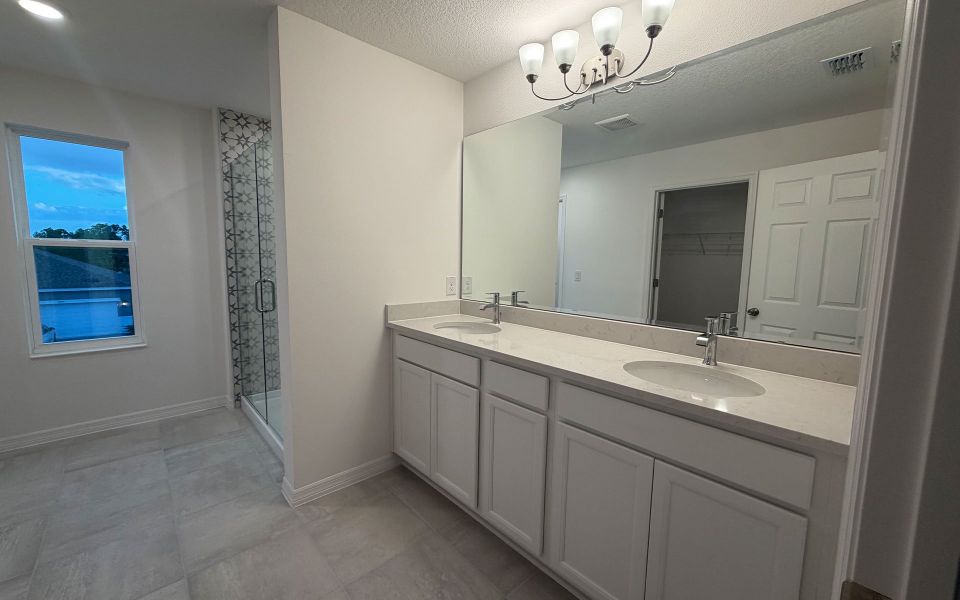 Furnished interior view inside a new home in Trinity Gardens, Deland (Image 10).