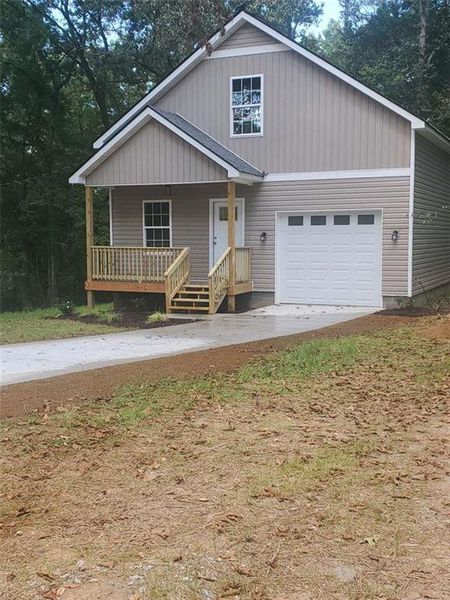 Front exterior of a new home in , Calhoun, GA, highlighting curb appeal (Image 2). Front exterior of a new home in , Calhoun, GA, highlighting curb appeal (Image 2).