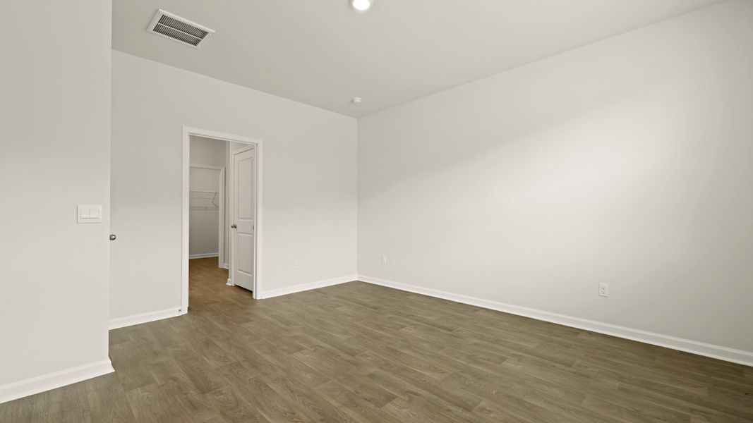 Spacious, unfurnished interior of a new home in Pine Hills at Cane Bay, Summerville (Image 15). Spacious, unfurnished interior of a new home in Pine Hills at Cane Bay, Summerville (Image 15).