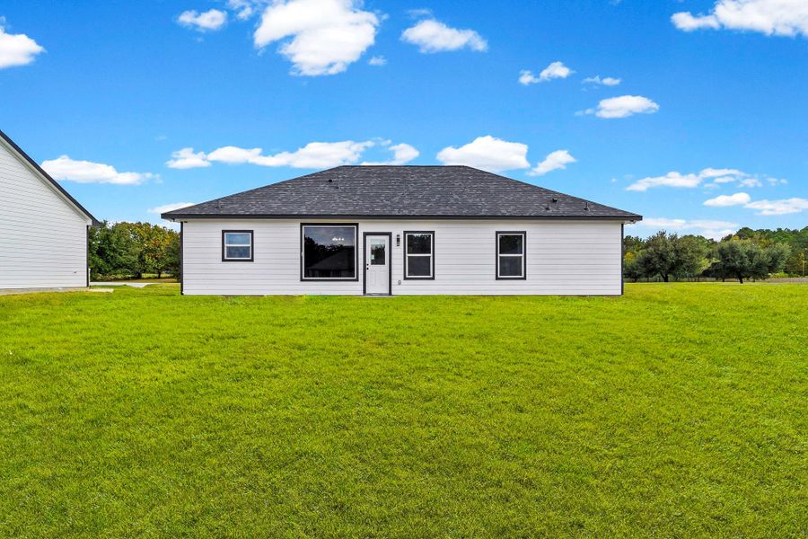 Exterior details and patio area of a home in , Trinity (Image 3).