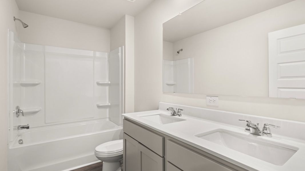 Representative furnished interior of a home built from the Penwell by D.R. Horton in Bridle Creek, Locust Grove (Image 7).