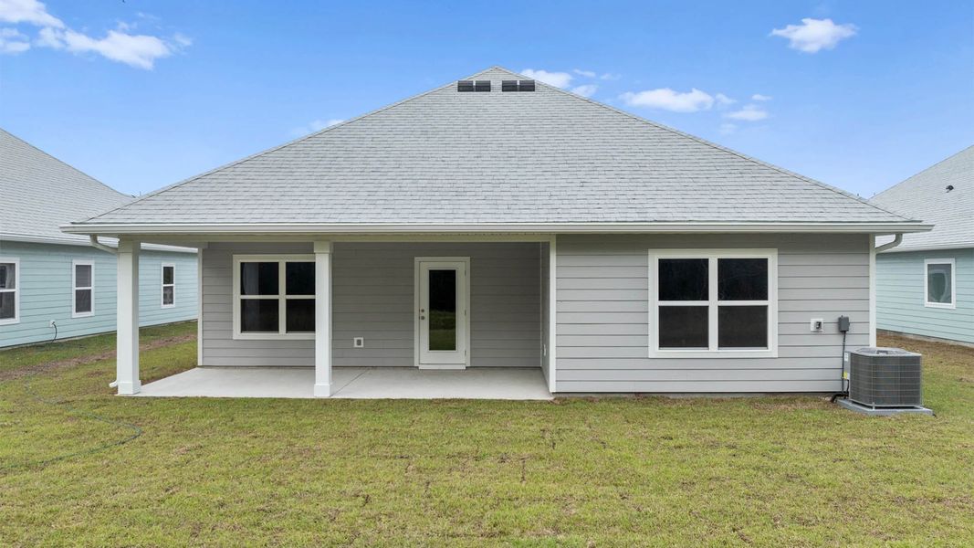 Exterior details and patio area of a home in Buffer Farms, Port Saint Joe (Image 17).