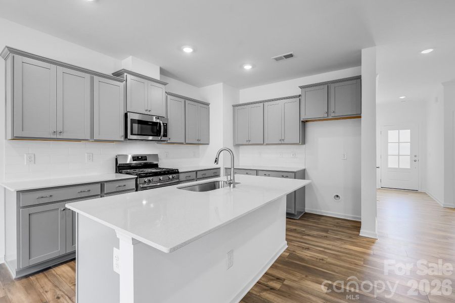 Furnished interior view inside a new home in Cannon Village, York (Image 6).