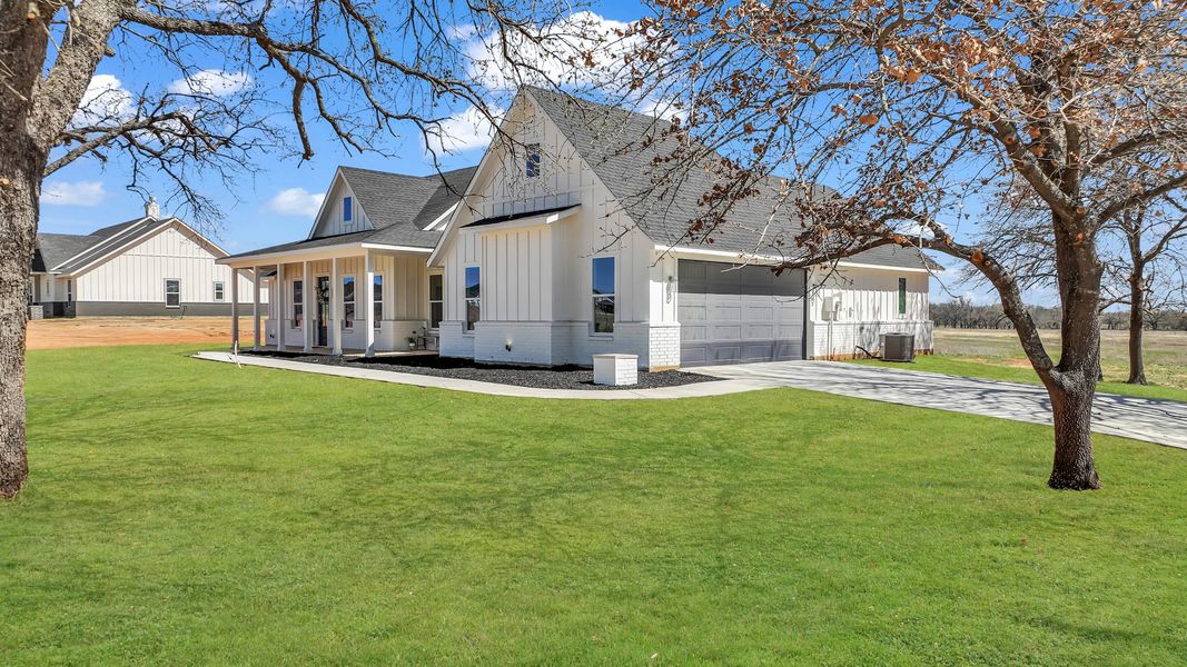 Representative exterior photo of a completed home built from the Clementine by Zeal Home Builders in Saddle Crest Estates, Weatherford, TX (Image 28).