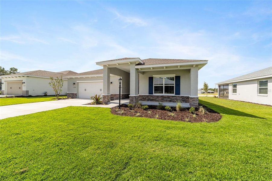 Exterior details and patio area of a home in On Top of the World Communities, Ocala (Image 23).